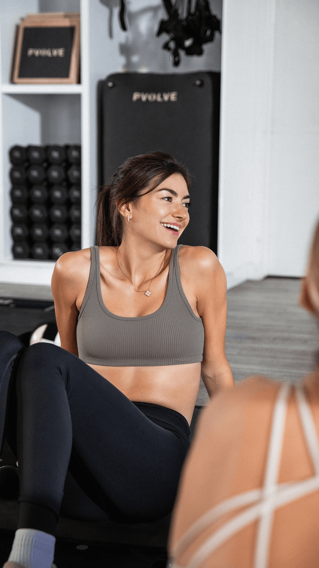 Woman smiling in PVOLVE studio